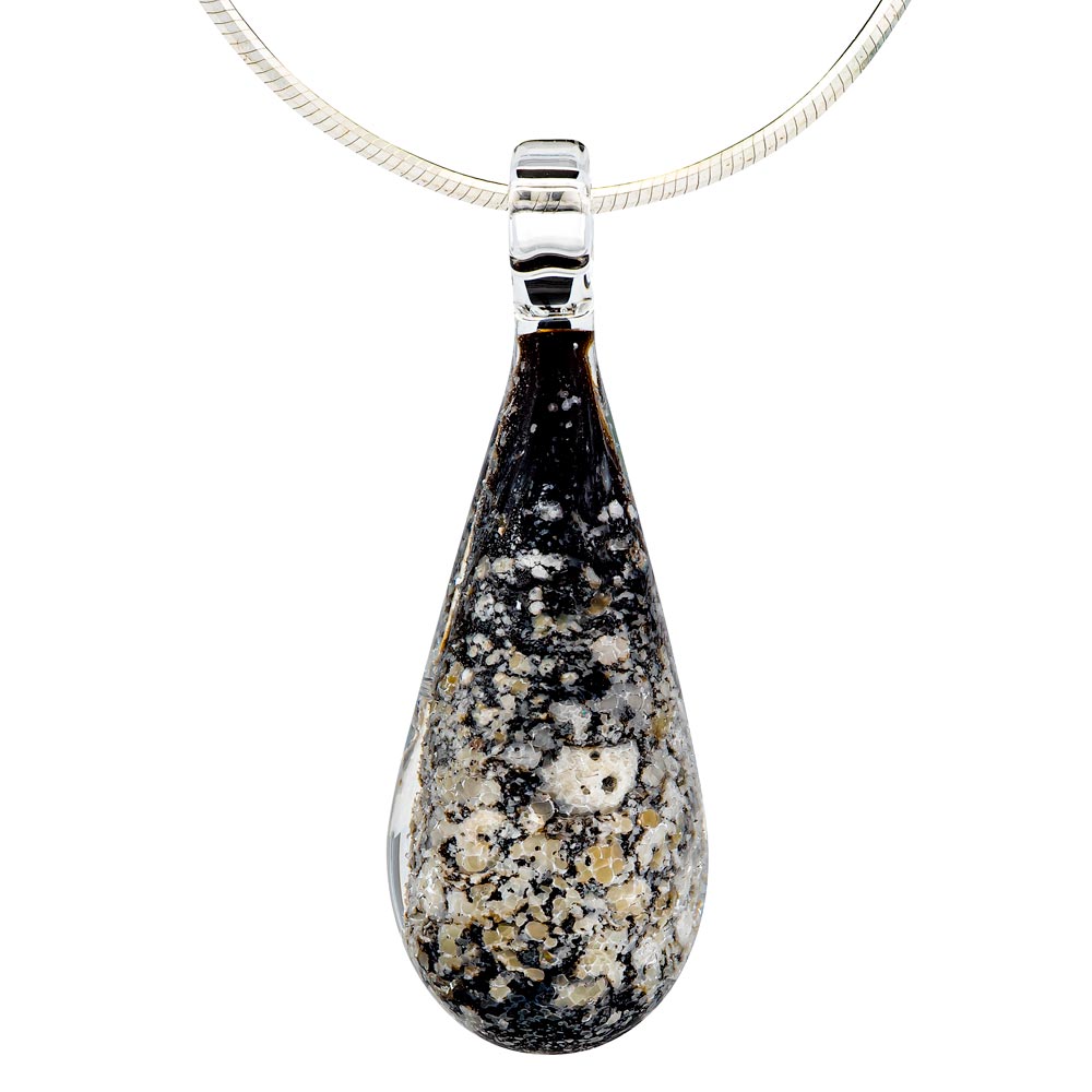 A black glass teardrop cremation pendant hangs from a sterling silver chain necklace.