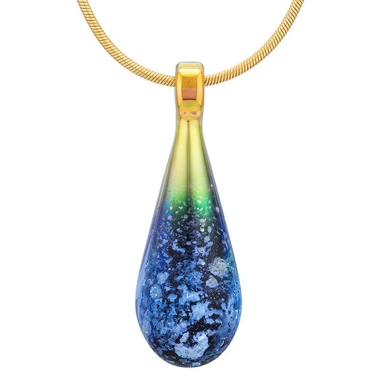 A bluish-black glass teardrop pendant necklace infused with cremation ashes, showcased on a sturdy gold snake chain against a clean white background.