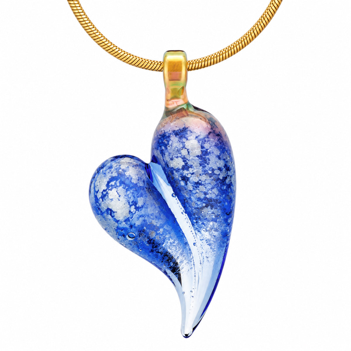 A Sapphire blue glass heart cremation pendant infused with a loved one's ashes