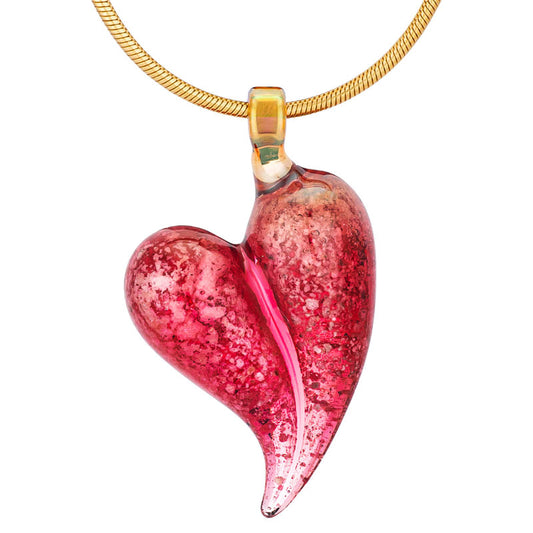 A pinkish-red glass heart memorial pendant hangs from a yellow gold snake chain.