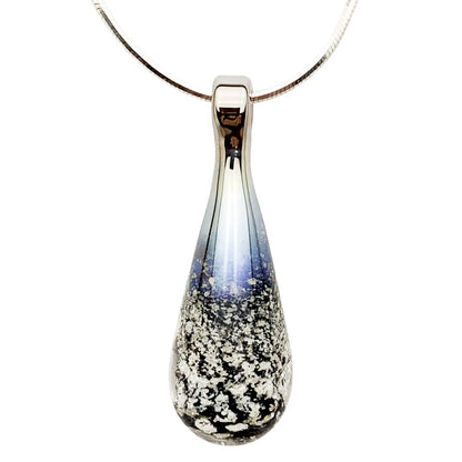 A black and silver glass teardrop pendant necklace infused with cremation ashes, showcased on a sturdy silver snake chain against a clean white background.