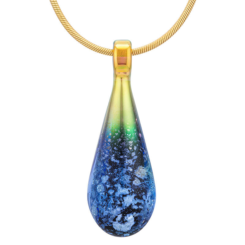 A bluish-black glass teardrop pendant necklace infused with cremation ashes, showcased on a sturdy gold snake chain against a clean white background.