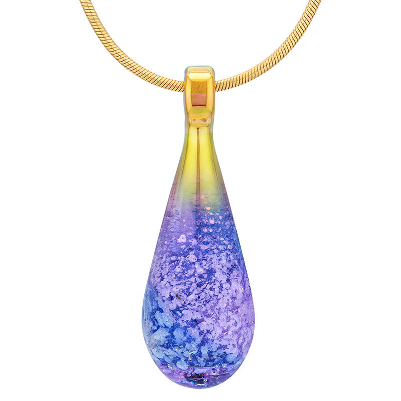 A blue and purple glass teardrop pendant necklace infused with cremation ashes, showcased on a sturdy gold snake chain against a clean white background.