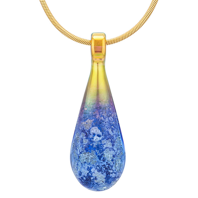 A cobalt-blue glass teardrop pendant necklace infused with cremation ashes, showcased on a sturdy gold snake chain against a clean white background.